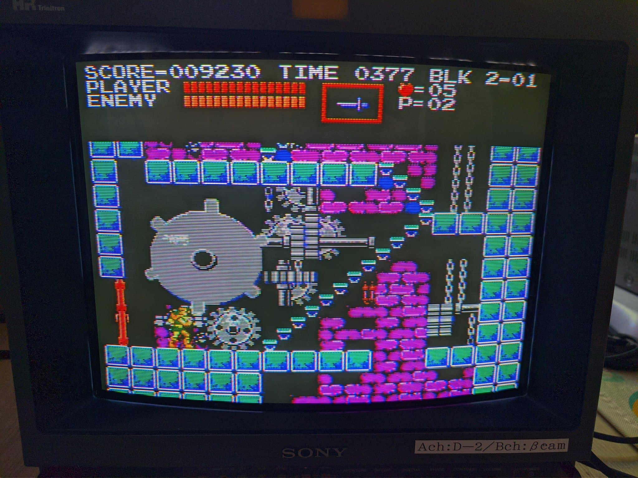 Castlevania 3 running on repaired Famicom with composite mod board installed, displaying colorful 8-bit gameplay on CRT monitor.