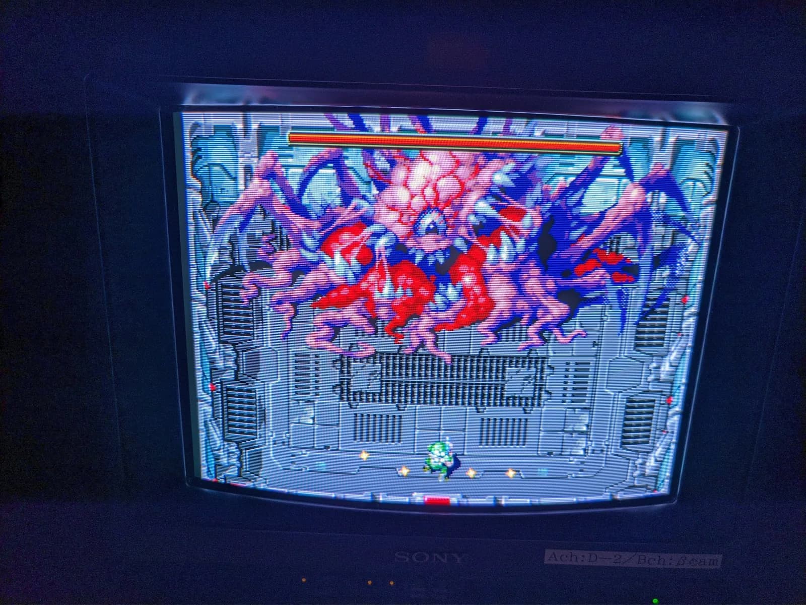 Sony PVM-14M4J displaying vibrant 800TVL test pattern with restored color output; retrace line issue resolved after repair.