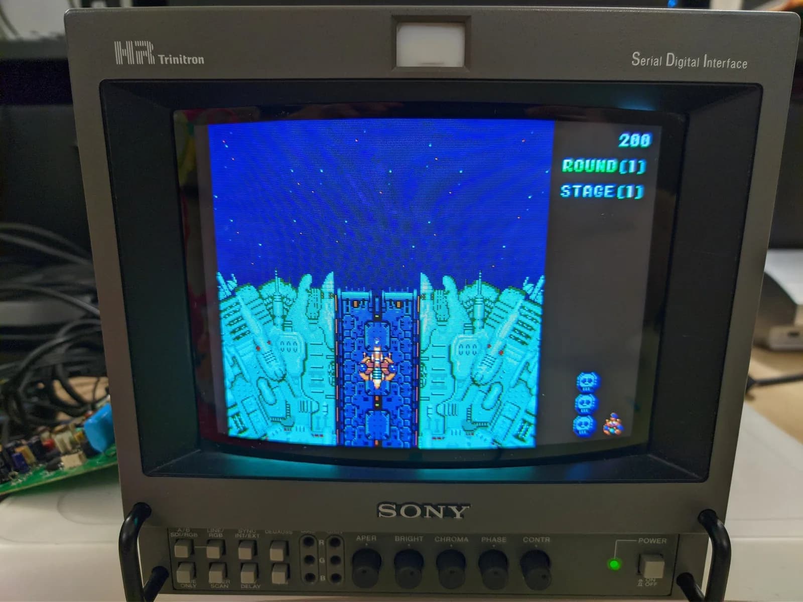 Sony BVM-9045QD displaying Super Metroid gameplay after restoration; vibrant colors restored, HUD showing 200 points, Round 1, Stage 1.