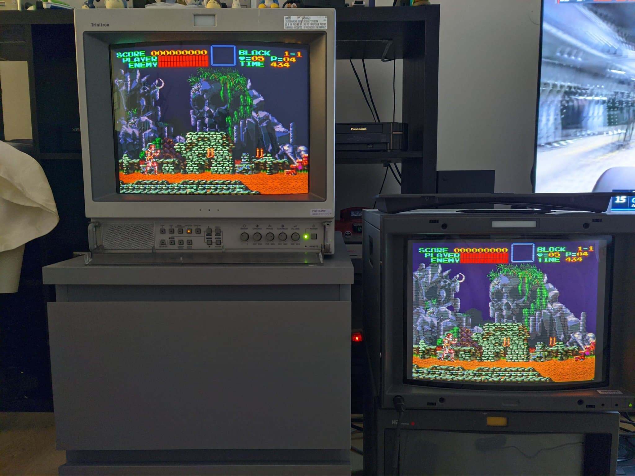 Two Sony PVM monitors displaying Castlevania arcade gameplay side-by-side, demonstrating daisy-chained CRT monitor setup and display quality.