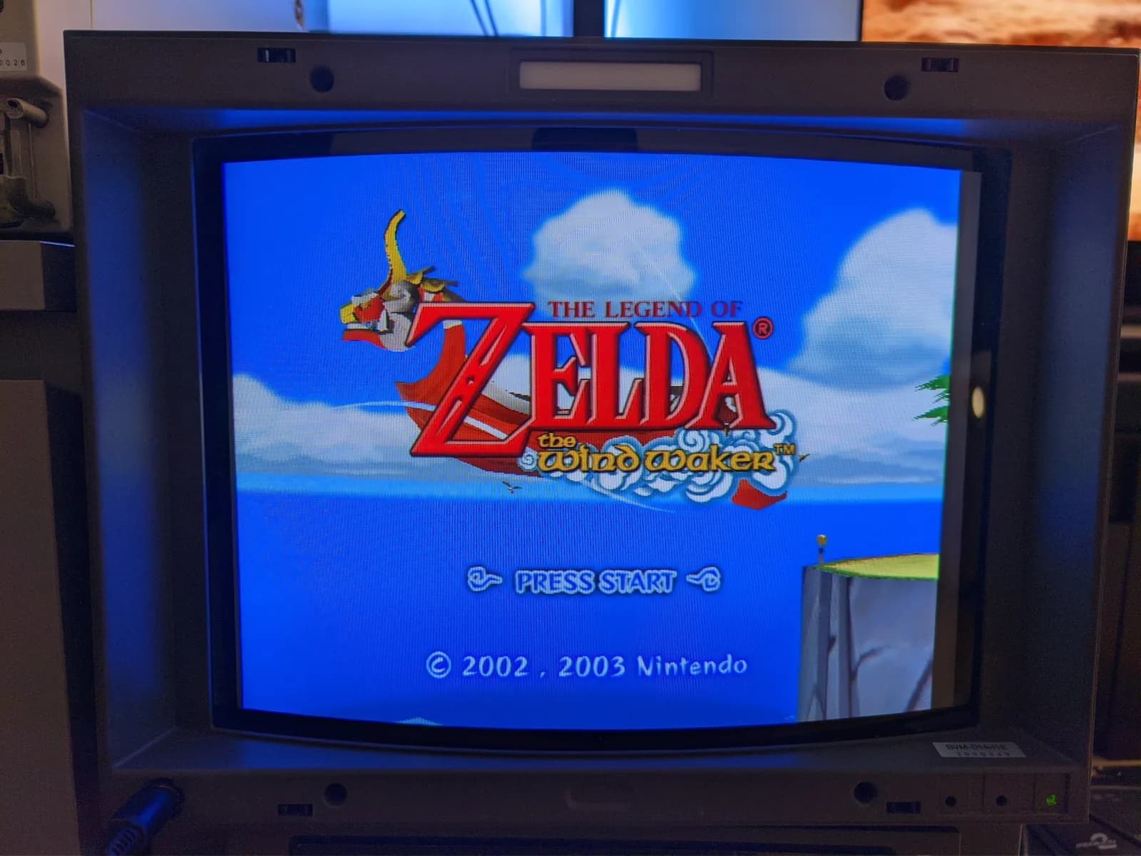 The Legend of Zelda: The Wind Waker title screen (PRESS START) on a Sony BVM-D14H1E CRT monitor, shown in 4:3 with the front fascia removed.
