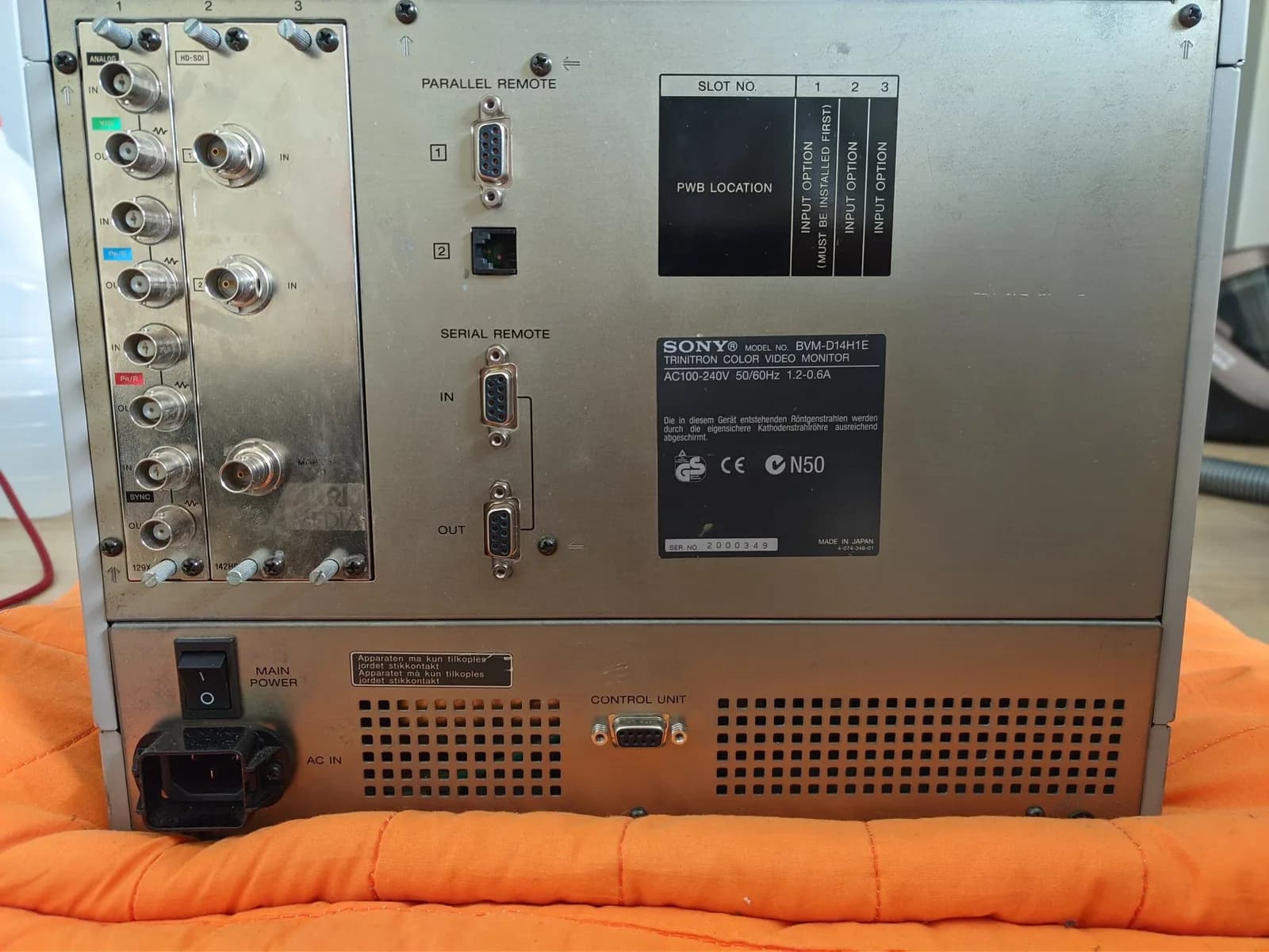 Sony BVM-D14H1E professional monitor rear panel showing input connectors, remote ports, slot configuration, and control unit with power switch.