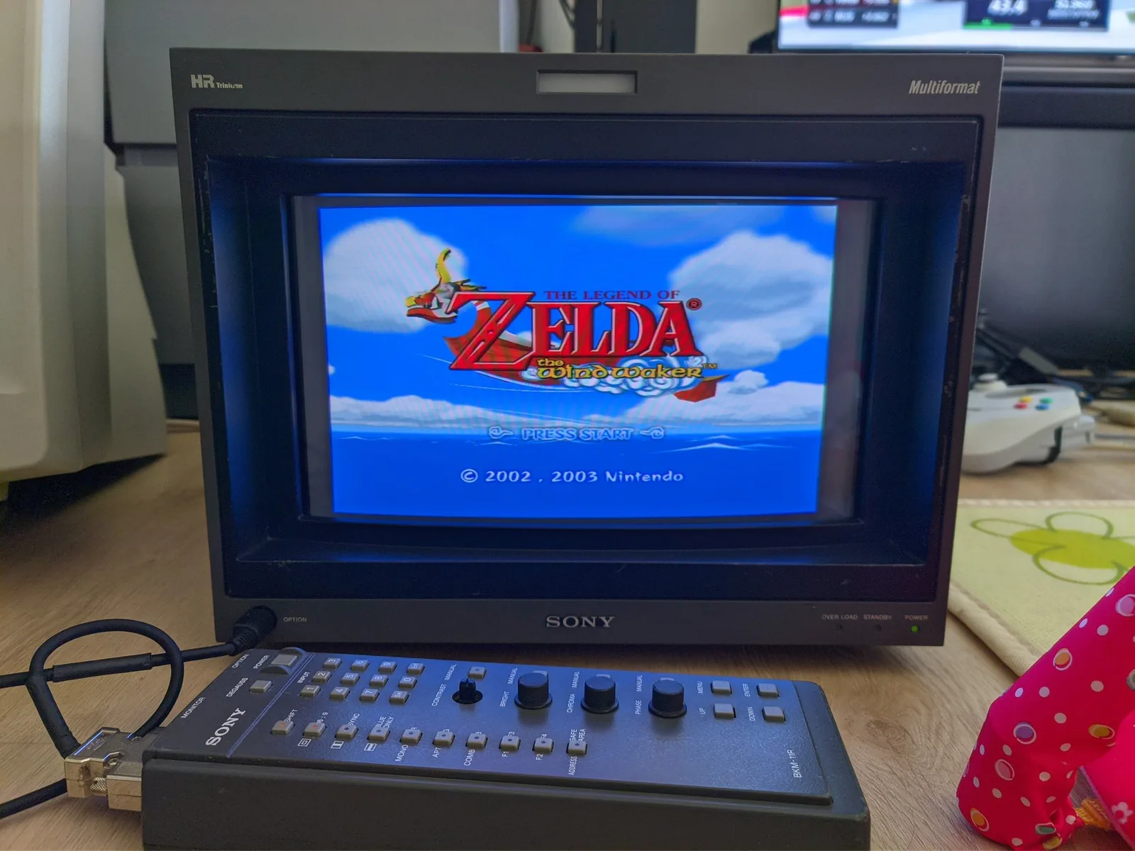Sony BVM-D14H1E CRT showing The Legend of Zelda: The Wind Waker title screen (running at 480p), a Sony BKM-11R control panel in the foreground.