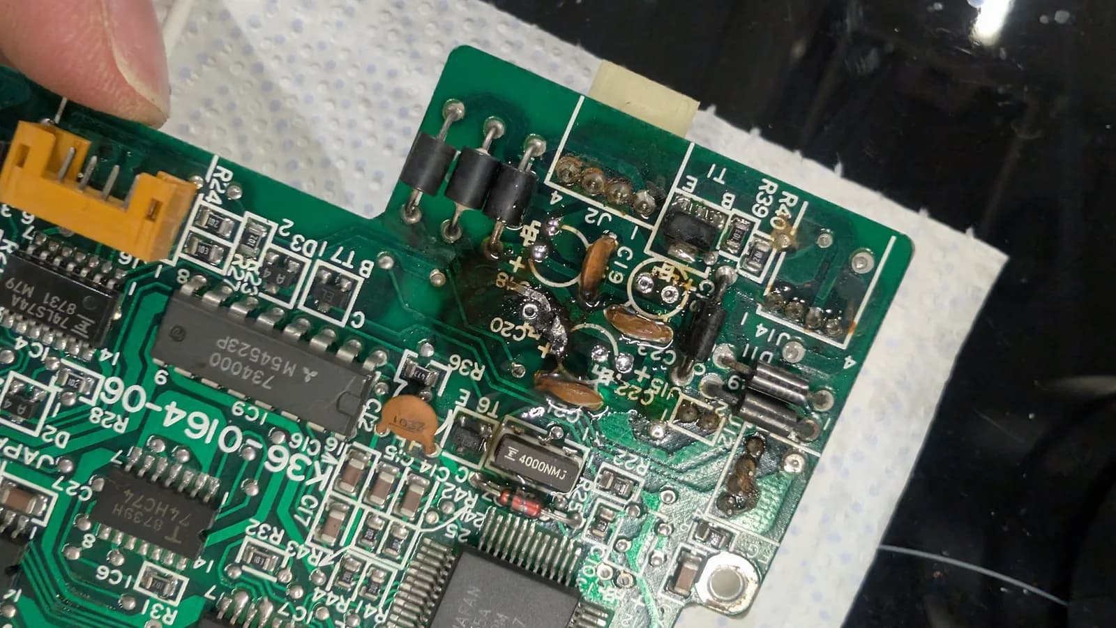 The FDD controller PCB after cleanup, its broken trace not yet patched.