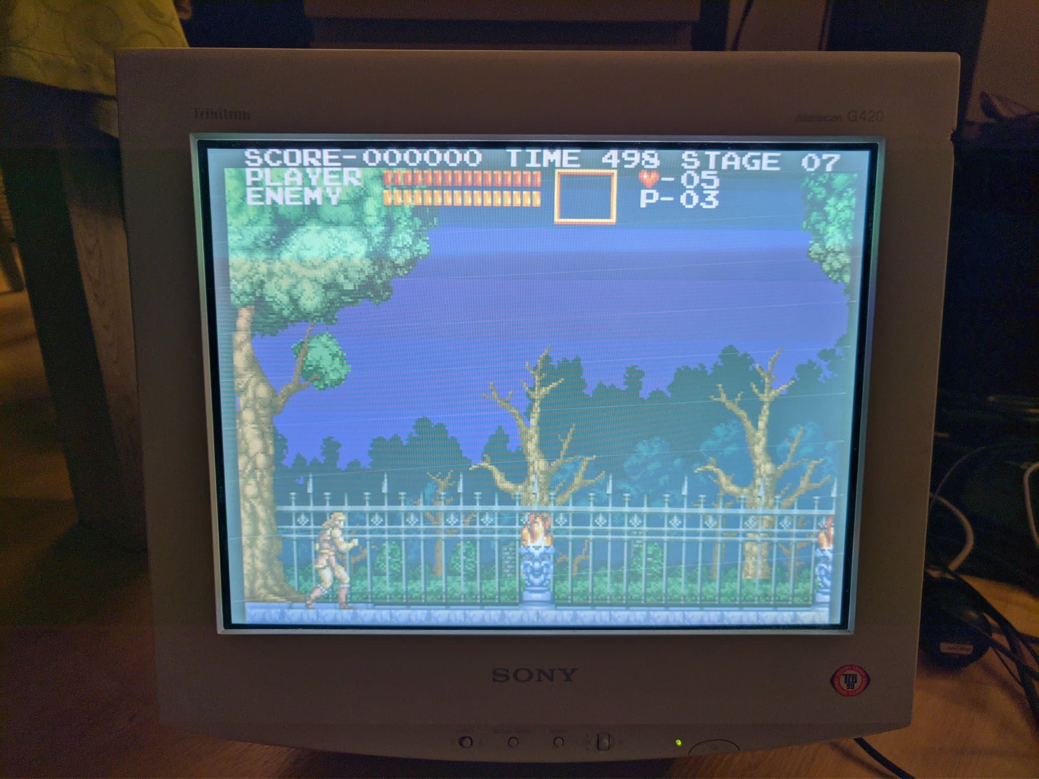 Castlevania Chronicles at Stage 07 on the Sony CPD-G420 during the geometry-fault diagnosis, a side-scrolling level with a gothic fence and bare trees.