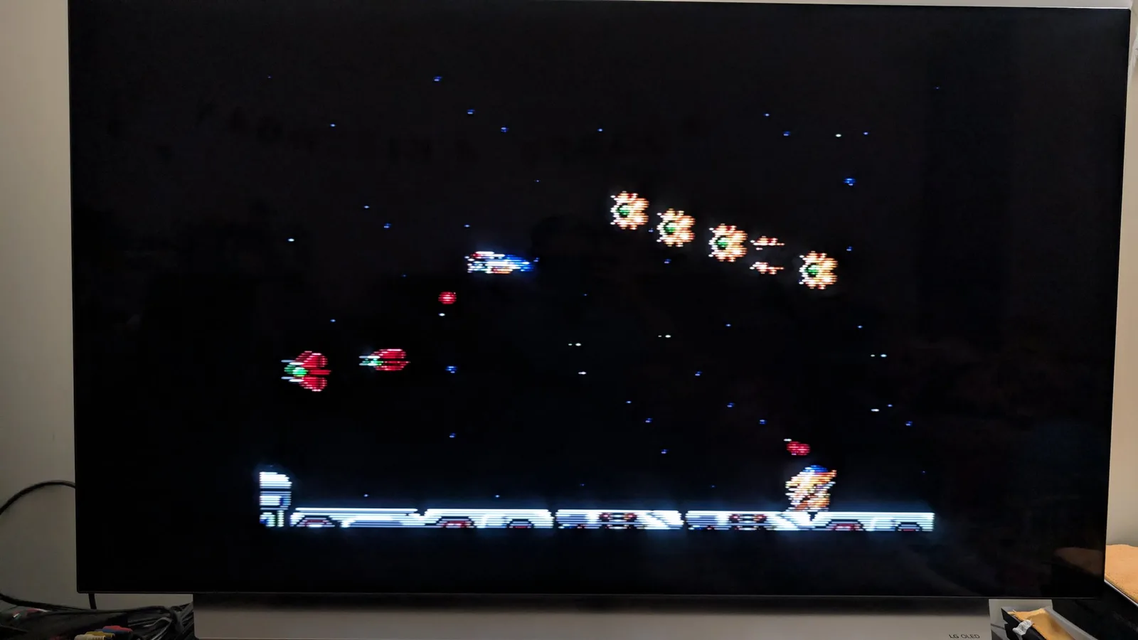 Master System displaying R-Type gameplay with enemy formations and player ship on screen after refurbishment and testing.