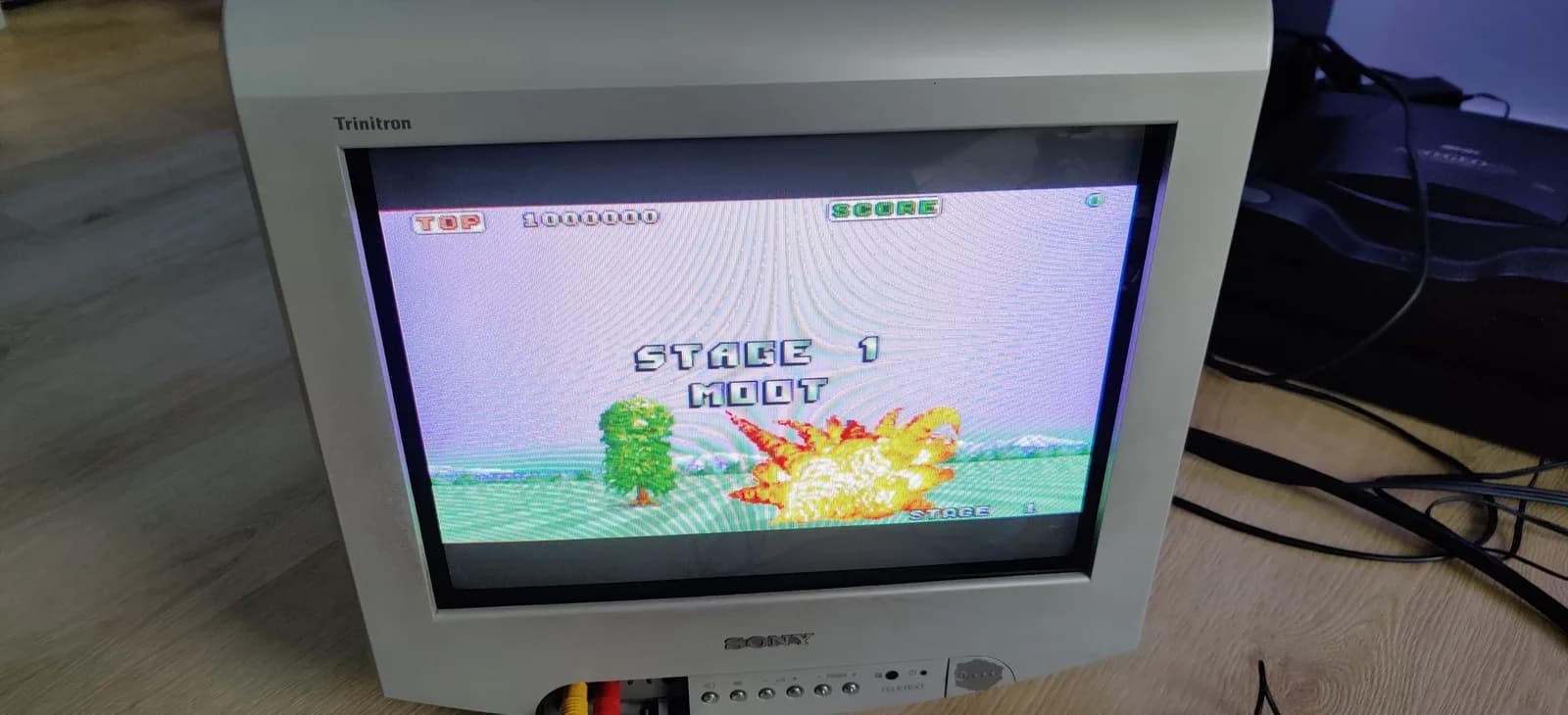 Sega 32X running Stage 1 of Space Harrier on a Sony Trinitron CRT, confirming the switchless auto-hertz mod outputs picture on the PAL Mega Drive.