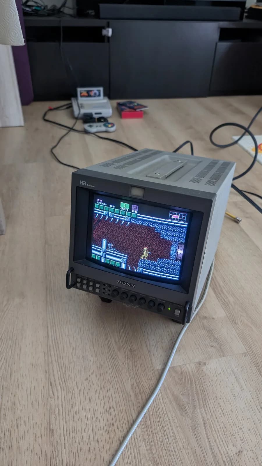 Sony PVM monitor displaying Super Famicom Jr. gameplay output, demonstrating successful video signal after recapping and restoration work.
