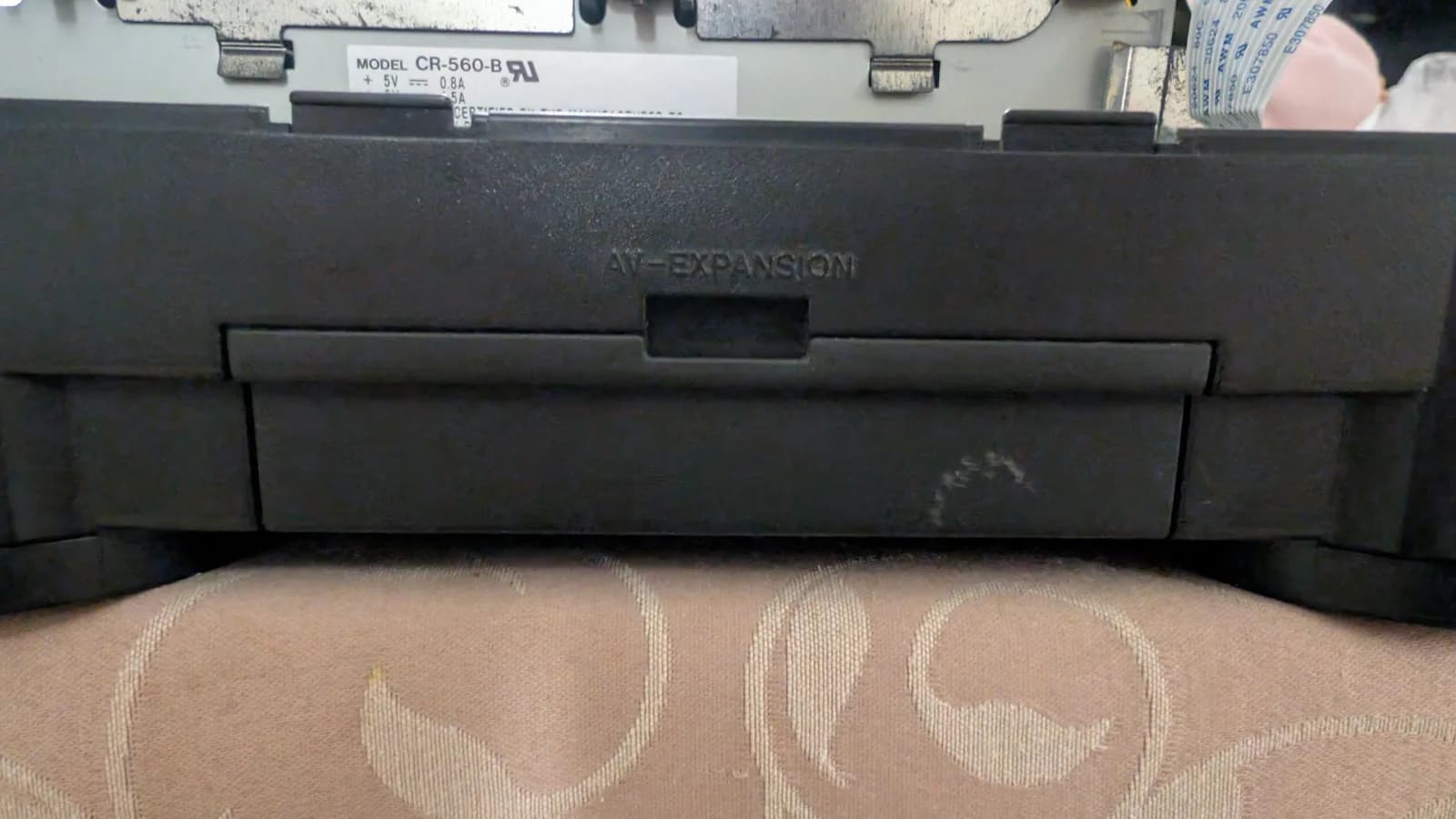 The right side of the Panasonic FZ-1 3DO (viewed from the front), showing the "AV-EXPANSION" flip door, the bay behind which the SD card extender for the ODE will live for easy storage access.