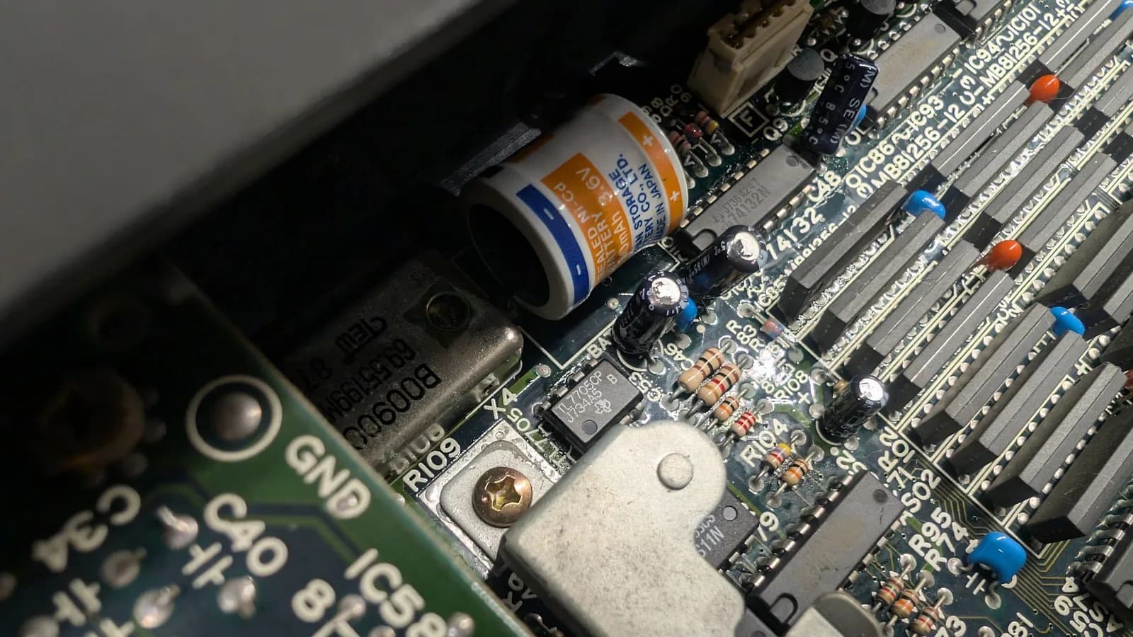 Another angle of the cleaned Sharp X68000 main board after the vinegar and IPA, the battery-leak area now free of corrosion.
