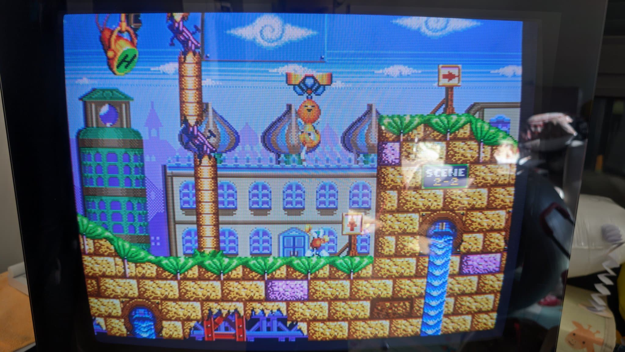 Bang & Olufsen Beovision 1 displaying vibrant arcade game graphics after X2 safety cap repair and Velocity Scan Modulation disconnection.