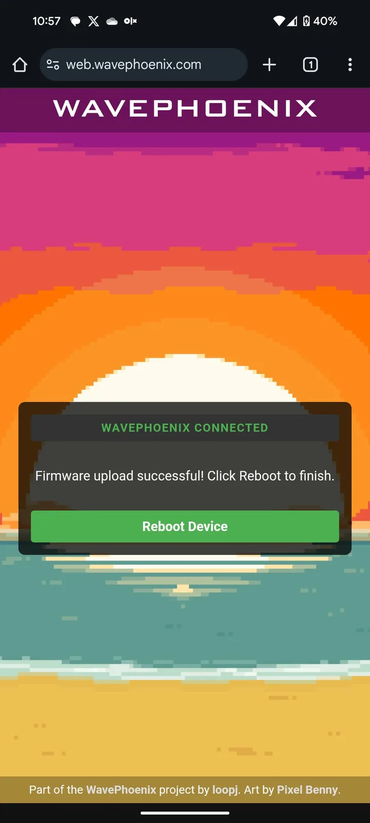 WavePhoenix updater showing 'Firmware upload successful! Click Reboot to finish' with a green 'Reboot Device' button on the pixel-art sunset background.