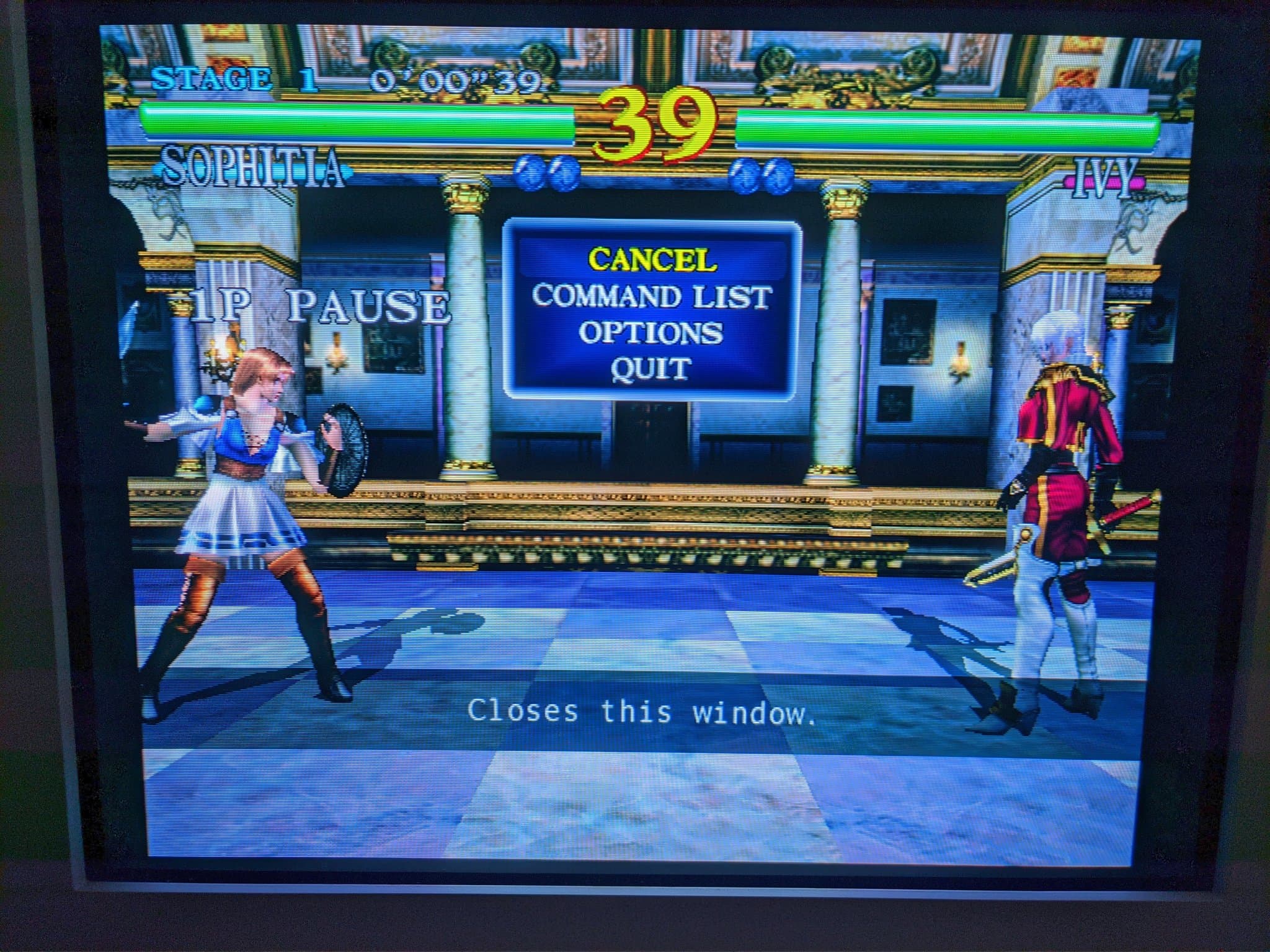 Soul Calibur on the Sony CPD-G420 showing Sophitia facing an opponent with the pause menu overlay, after the G2 calibration.