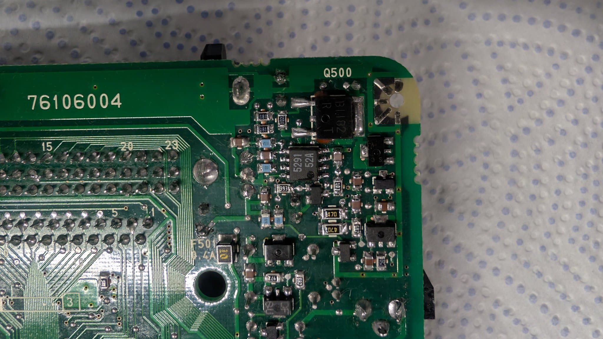 Close-up of the PC Engine LT board showing the Q500 position and the nearby newly installed 8-pin 6.5V regulator (M5291FP) marked 5291, with surrounding SMD parts.