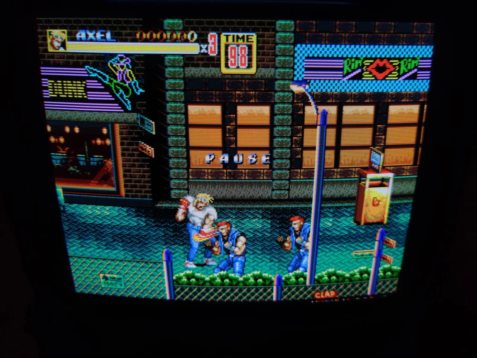 Streets of Rage gameplay on Ikegami HTM-1005RA2 CRT monitor showing vibrant colors, sharp image, and properly functioning display tube after transit damage assessment.