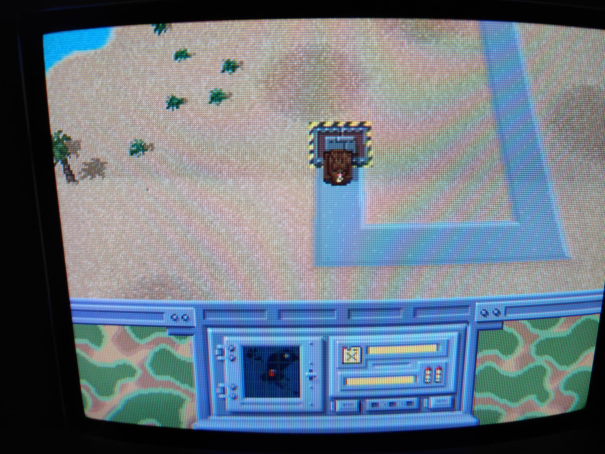Panasonic FZ-1 3DO running game with sandy beach scene, palm trees, and blue building structure visible on CRT display.