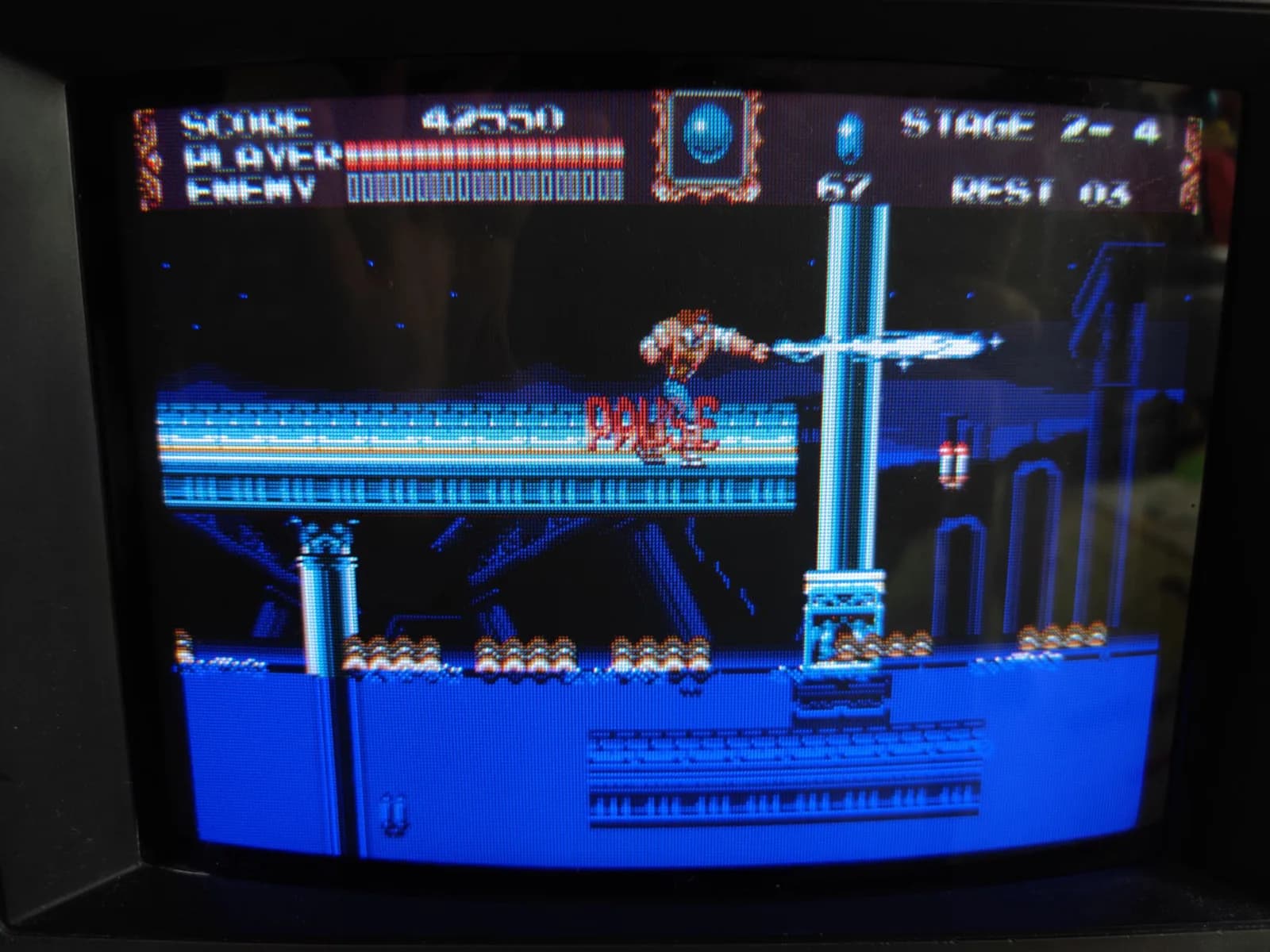 Close-up of the Sony PVM-9041Q screen during the incoming assessment, Castlevania Bloodlines paused mid-stage, before any work began.