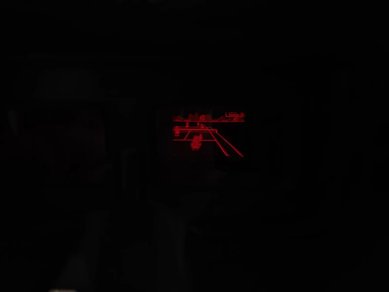 Thermal image showing red circuitry of Nintendo Virtual Boy display assembly during refurbishment testing and diagnostics.