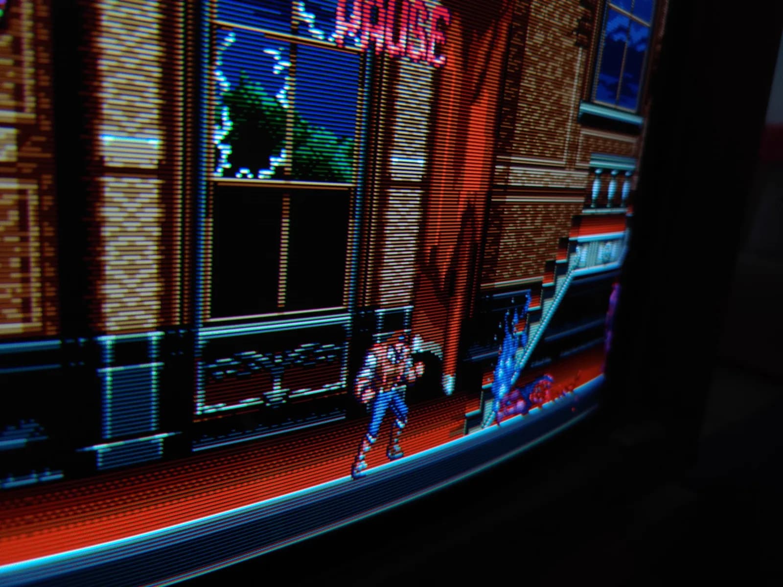 Close-up of Castlevania Bloodlines (a Sega Genesis game) on the Sony BVM-D14H1E, its fine scanlines and aperture grille visible across the gothic-mansion stage, the tube rated at 800TVL.