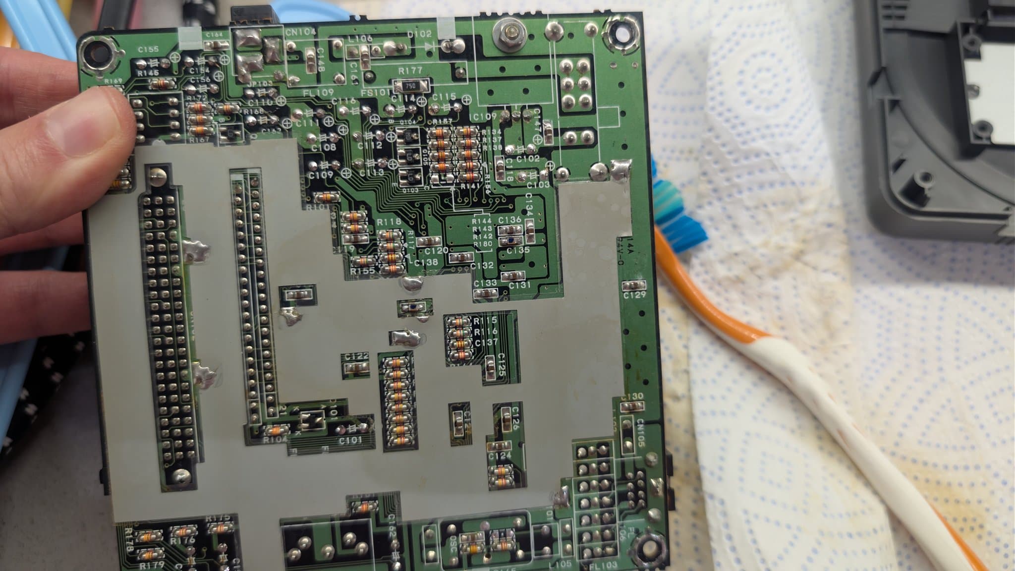 PC Engine CoreGrafx mainboard mid-recap, including the ceramic caps fitted for the jailbar fix.