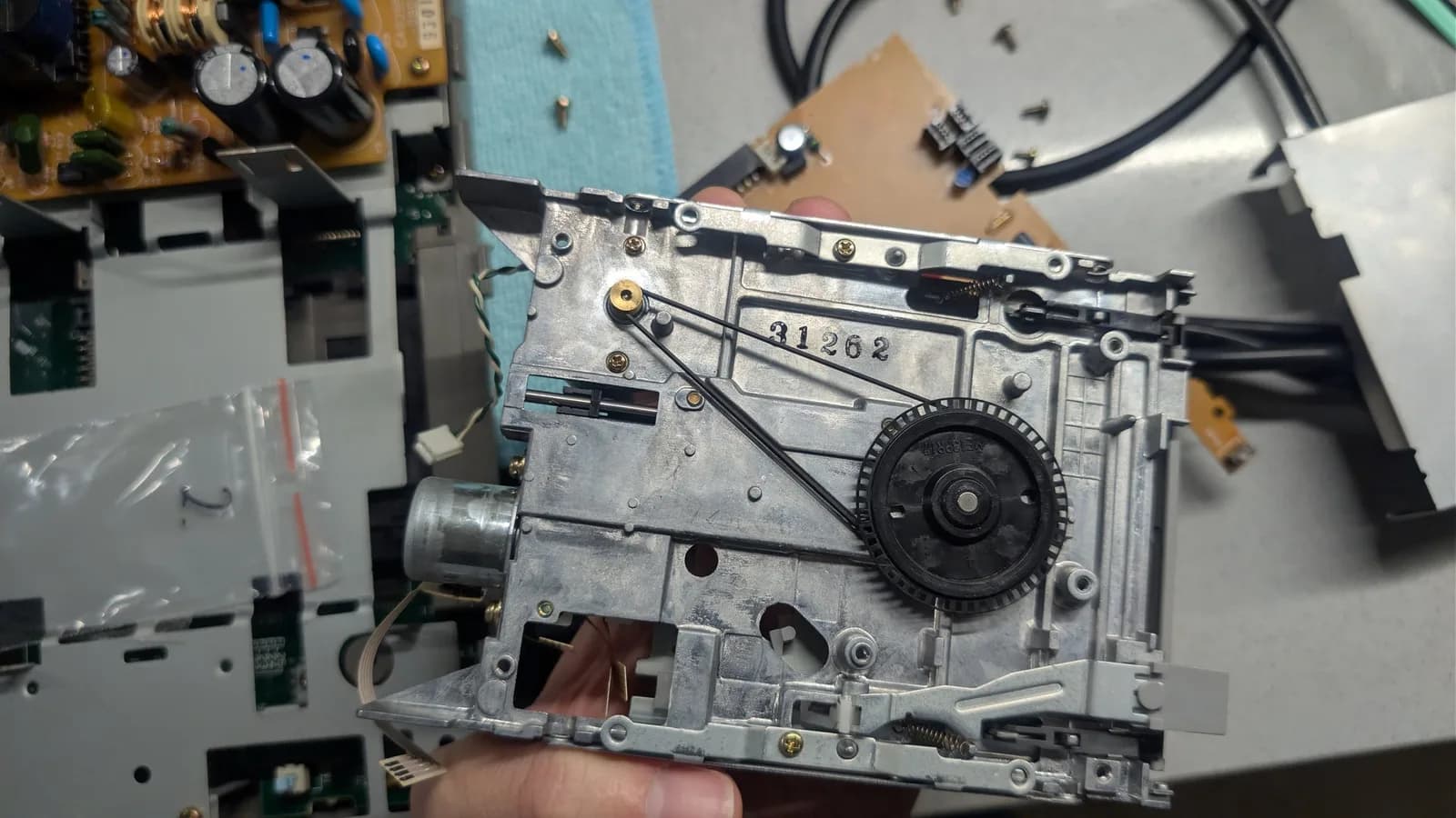 FM Towns Marty floppy drive mechanism showing spindle motor and drive head assembly, part number 31268 visible on metal chassis.