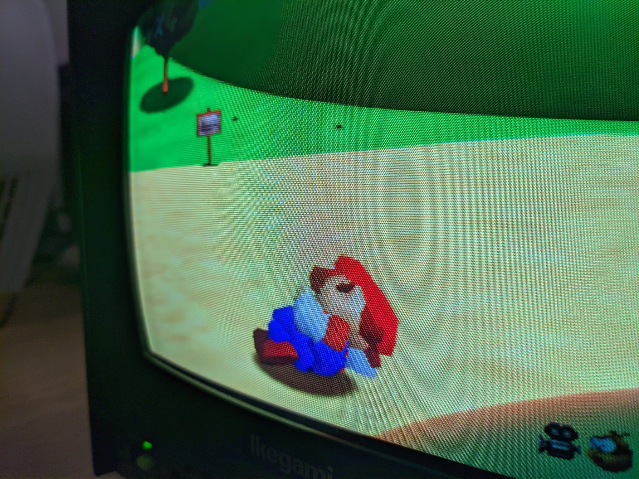 Super Mario 64 on the Ikegami TM10-17RA CRT, Mario standing on a grassy area.