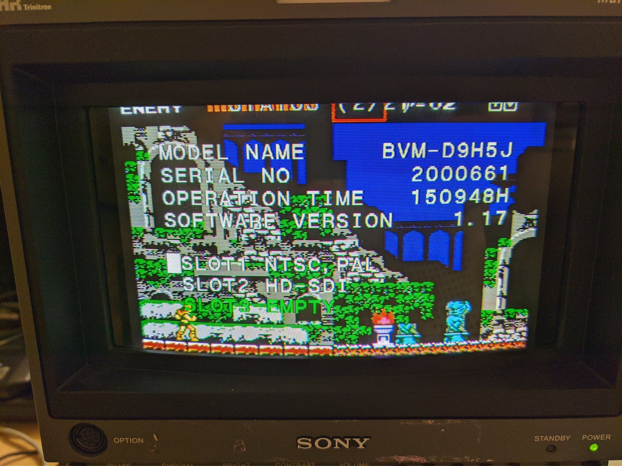 Sony BVM-D9H5J service menu displaying model info, serial 2000661, 150948 operation hours, software v1.17, with Castlevania gameplay visible.
