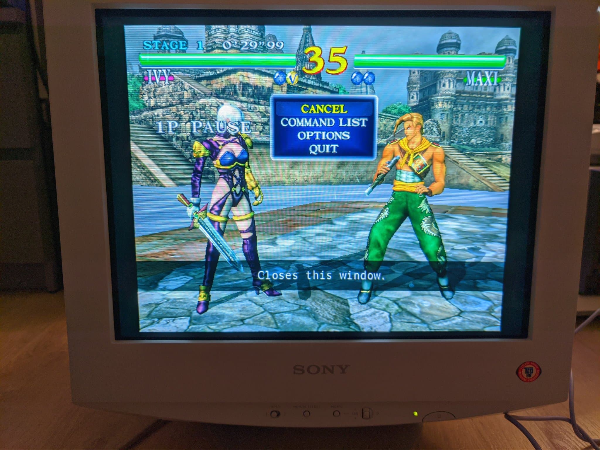 Soul Calibur on the repaired Sony CPD-G420 via Dreamcast direct input, paused (Ivy vs Maxi), with corrected geometry after the G2 white-point calibration.