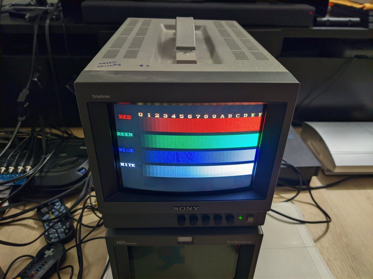Sony PVM-9040 Trinitron monitor displaying color test pattern with red, green, blue, and white bands showing known color shift issues requiring potentiometer replacement.