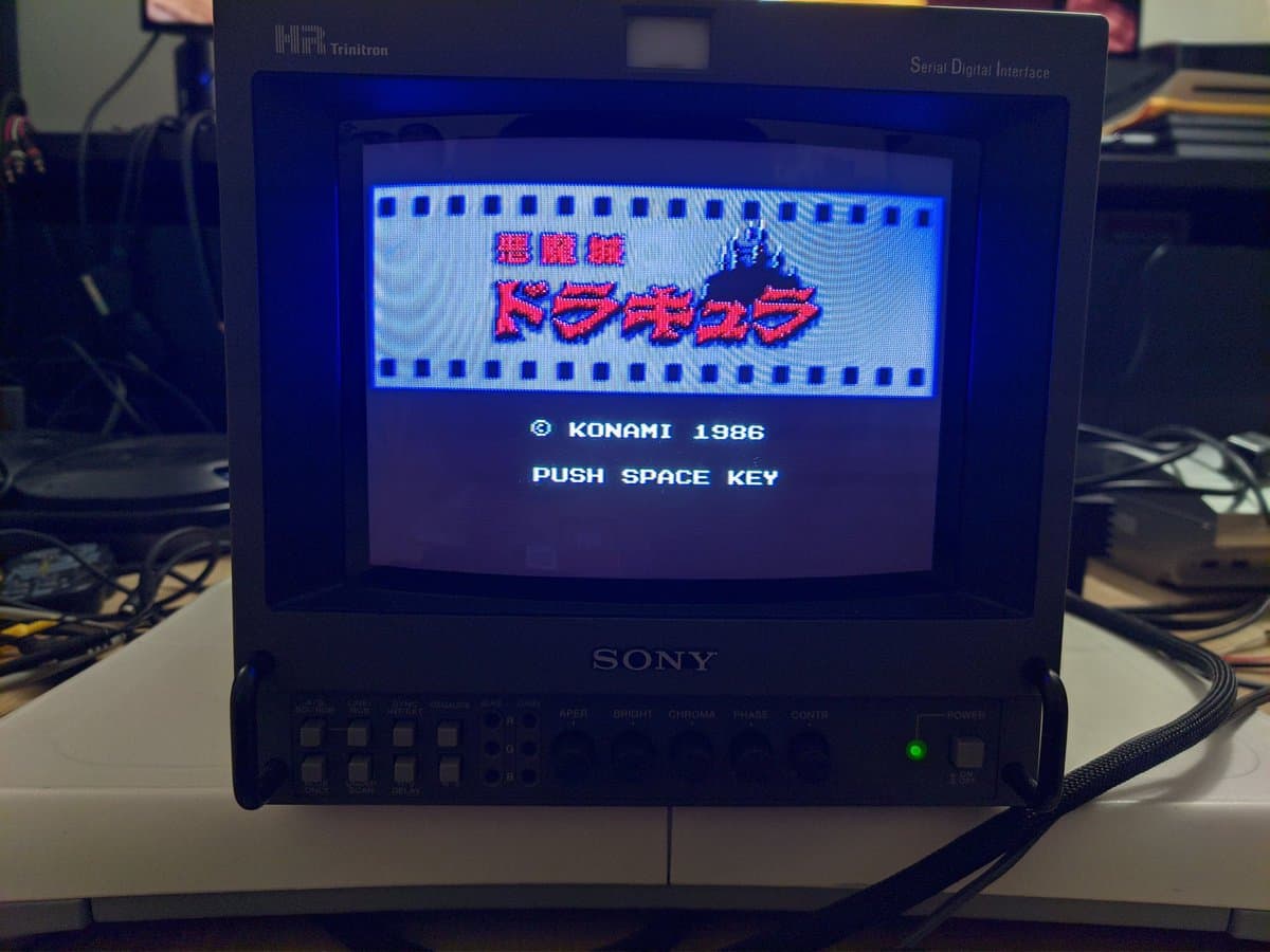 Sony Trinitron monitor displaying Castlevania title screen via composite video from MSX2+ console, repair blog documentation.