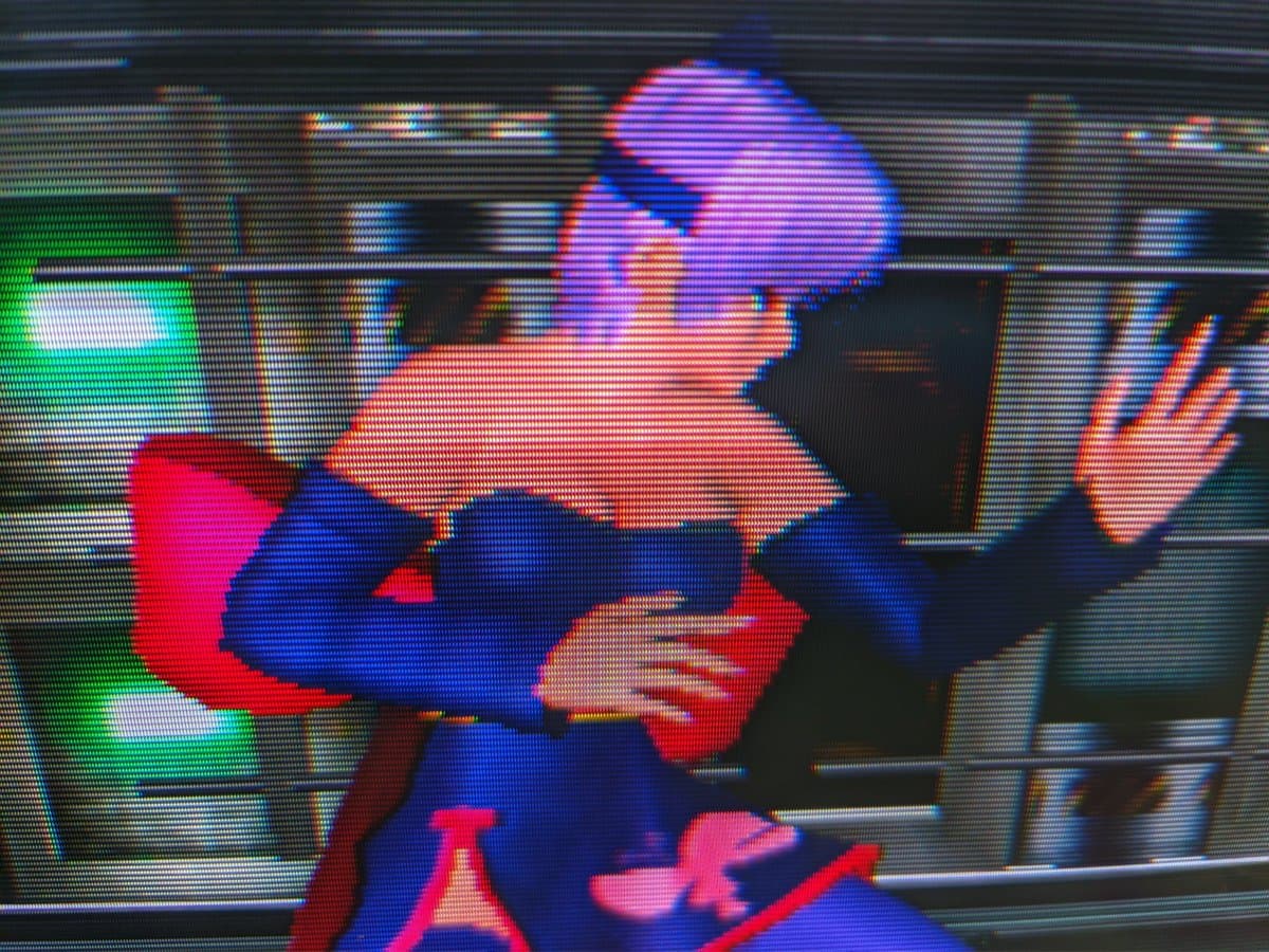 Sony CPD-E430 CRT displaying Dead or Alive 2 gameplay on Dreamcast, showing vibrant colors and scanlines during post-repair testing.