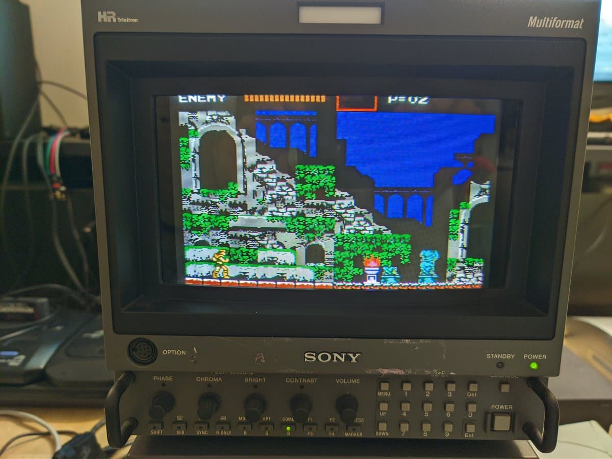 Sony BVM-D9H5J CRT displaying Castlevania gameplay with 150k-hour tube showing minimal degradation after restoration.