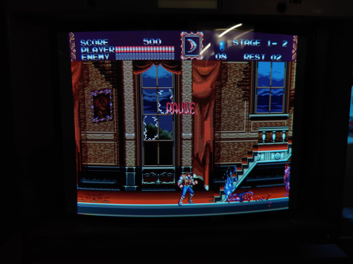 Castlevania Bloodlines running on restored Sony BVM-D14H1E CRT monitor displaying sharp scanlines, Stage 1-2 gameplay with HUD visible.