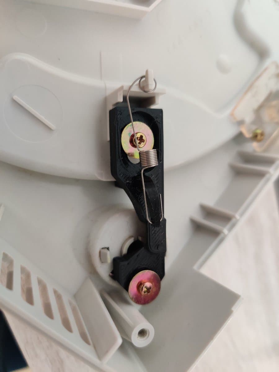 Black heatsink assembly with Noctua fan mounted on white Dreamcast VA1 motherboard, showing coil and thermal connections.