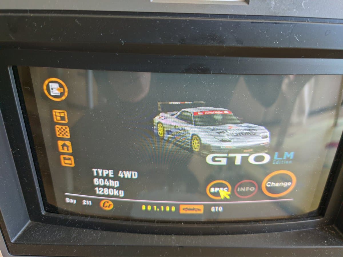 PSOne screen displaying Gran Turismo LM Edition car stats during gameplay, showing 4WD type, 604hp, 1280kg specifications.