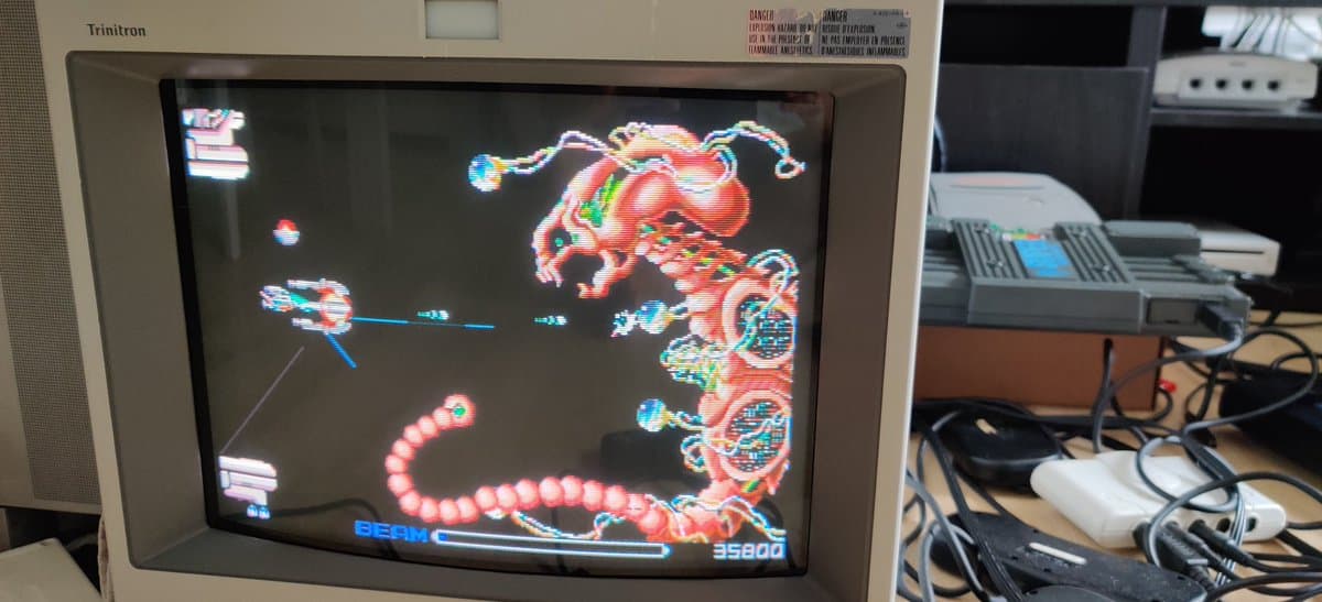 R-Type arcade shmup running on refurbished PC Engine SuperGrafx connected to Tritton CRT monitor, displaying repaired console gameplay testing.