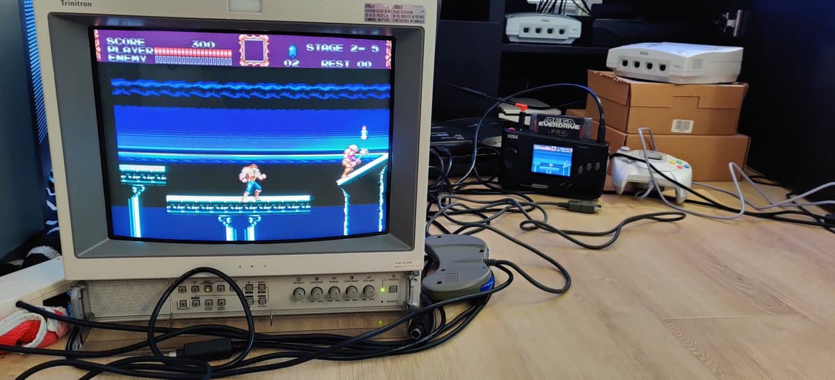 Restored Sega Nomad displaying Castlevania Bloodlines on Sony PVM monitor, showing Stage 2-5 gameplay with score 300, test play after repair completion.