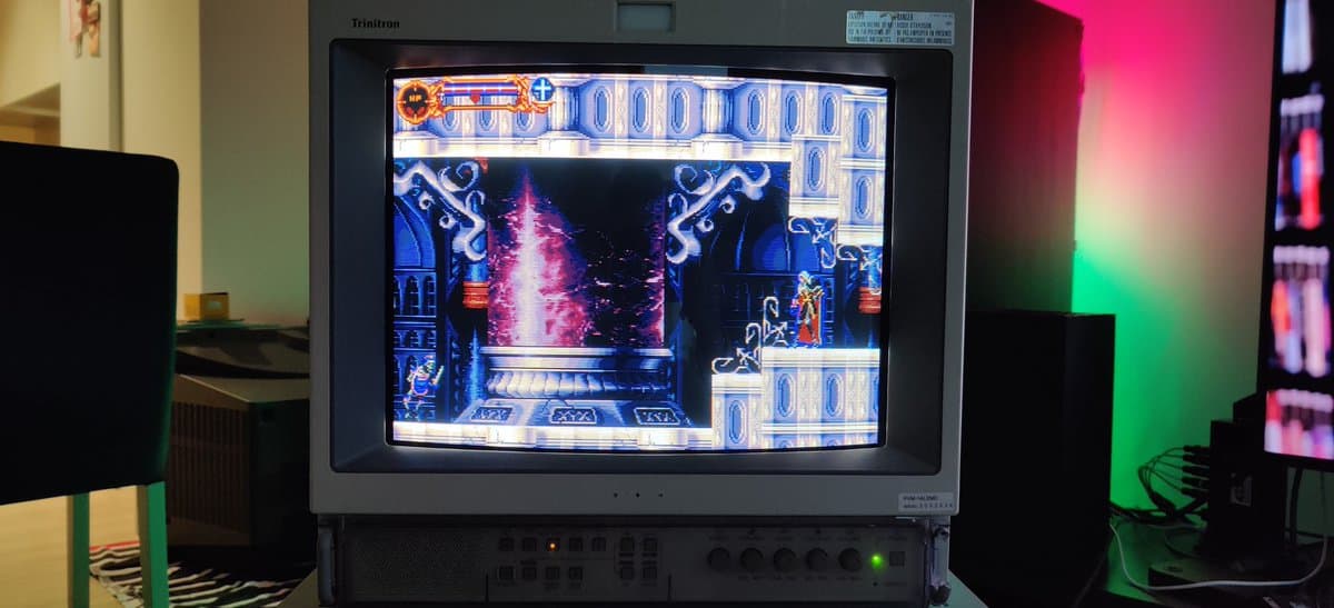 Sony PVM-14L2 displaying Castlevania: Symphony of the Night preview level with vibrant magenta and blue colors, demonstrating color accuracy and image quality post-maintenance.
