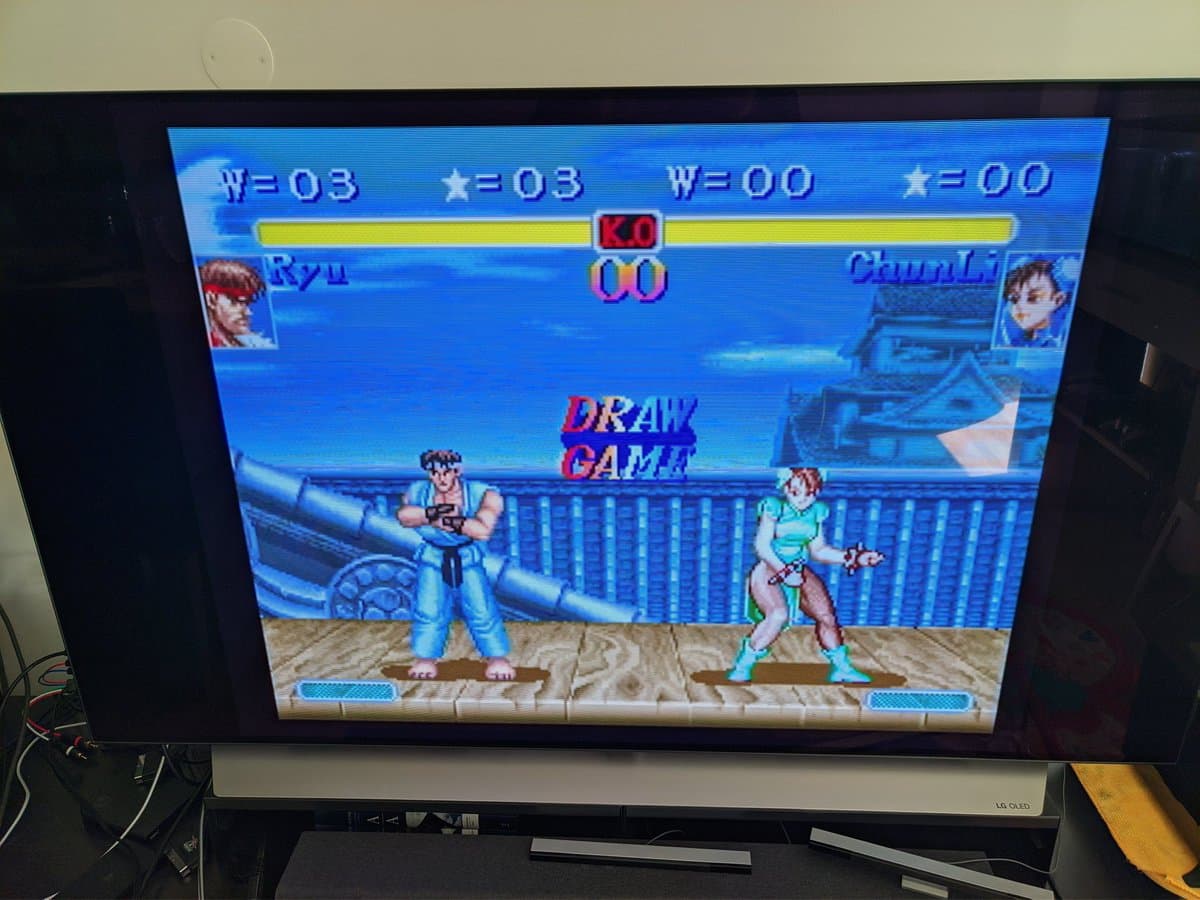 Street Fighter II on Panasonic FZ-1 3DO via S-video, showing Ryu vs Chun-Li match in progress with health bars displayed.
