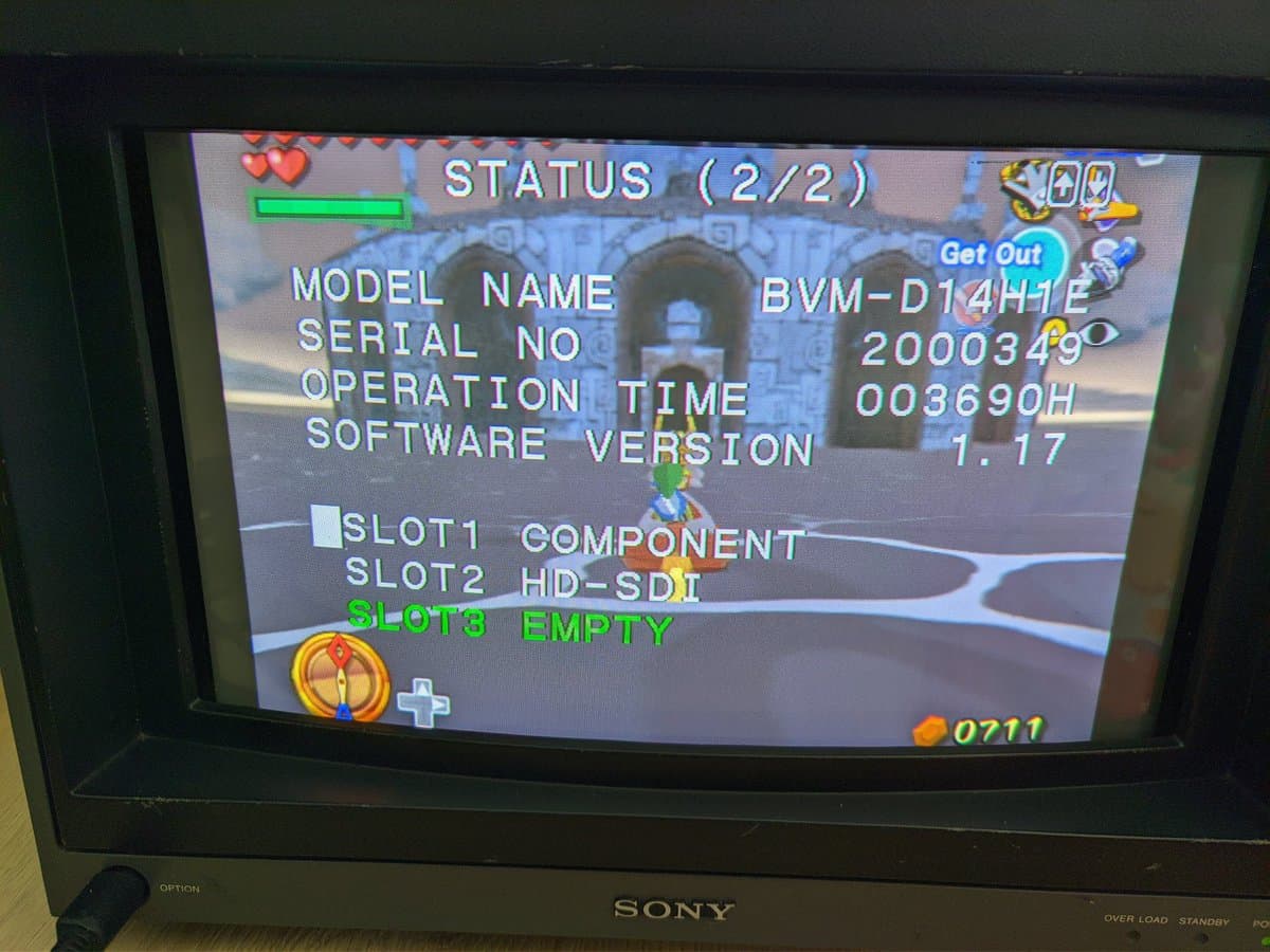 Sony BVM-D14H1E status screen showing model, serial 2000349, 3690h operation time, software v1.17, with COMPONENT and HD-SDI slots populated.