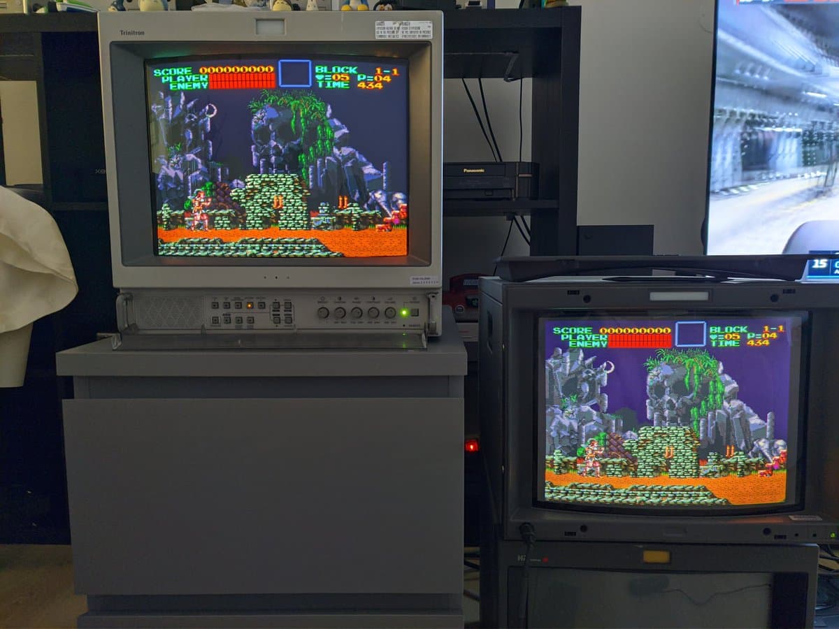 Two Sony PVM monitors displaying Castlevania arcade gameplay side-by-side, demonstrating daisy-chained CRT monitor setup and display quality.