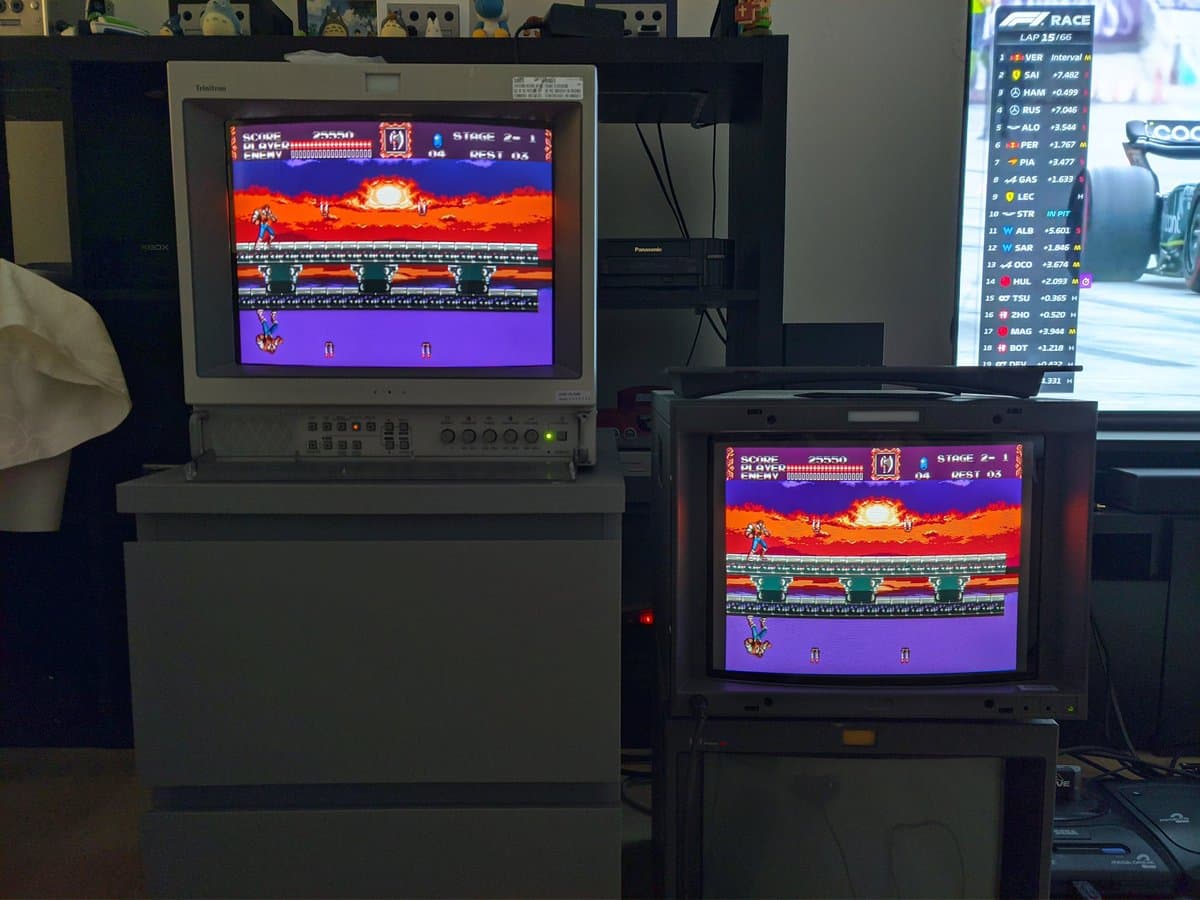 Two Sony BVM-D14H1E CRT monitors displaying Castlevania arcade game, daisy-chained setup showing identical video output on both screens.