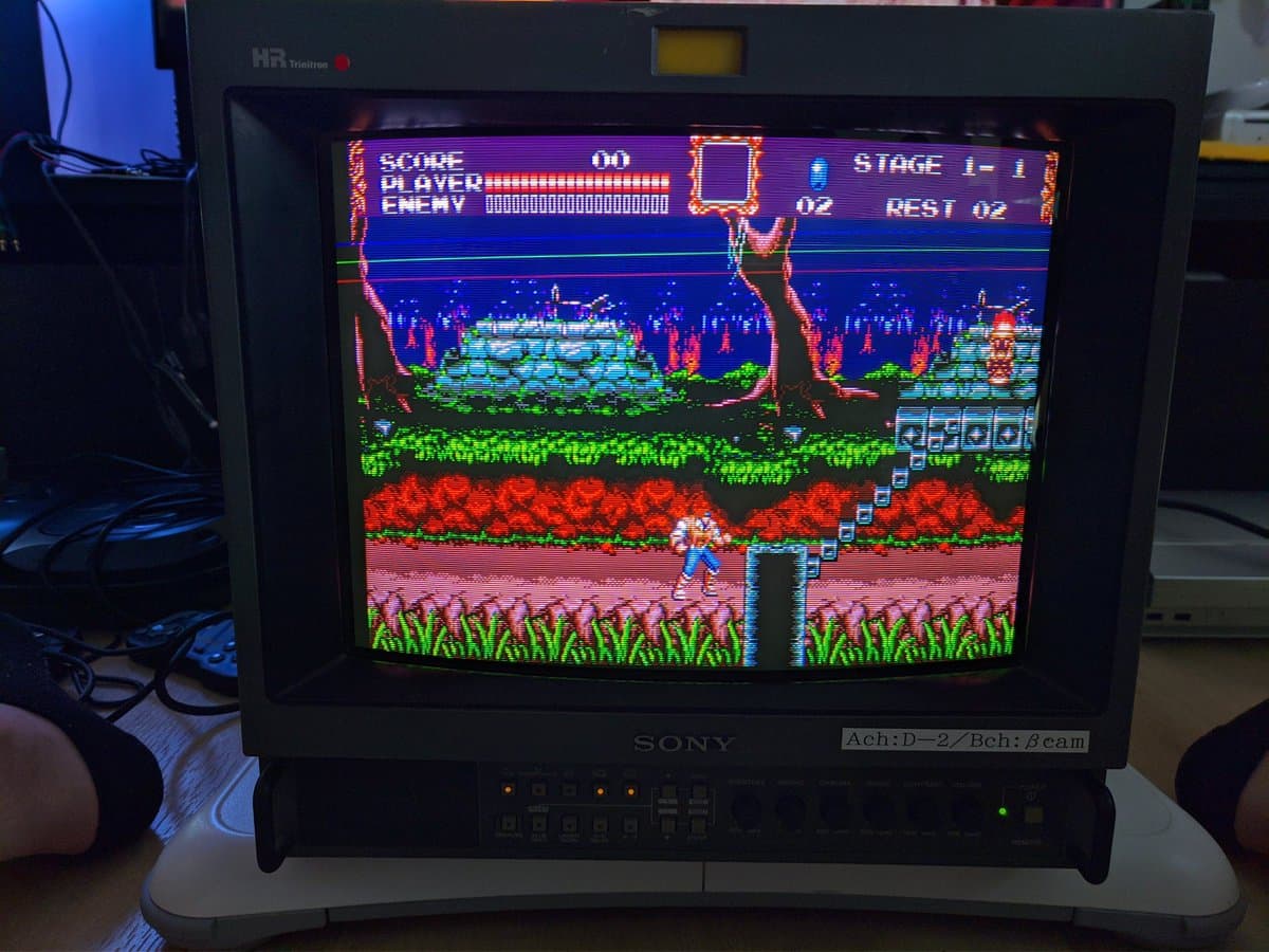Sony PVM-14M4J displaying Castlevania Stage 1-1 with restored blue color channel after pin reflow repair; retrace lines visible.