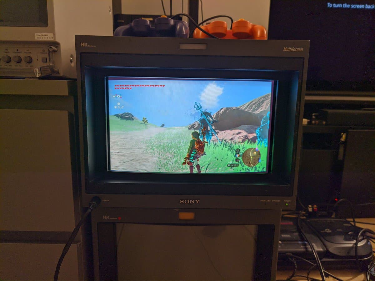 Sony BVM-D14H1E professional CRT monitor displaying The Legend of Zelda: Tears of the Kingdom gameplay, showing restored vibrant colors and image quality.
