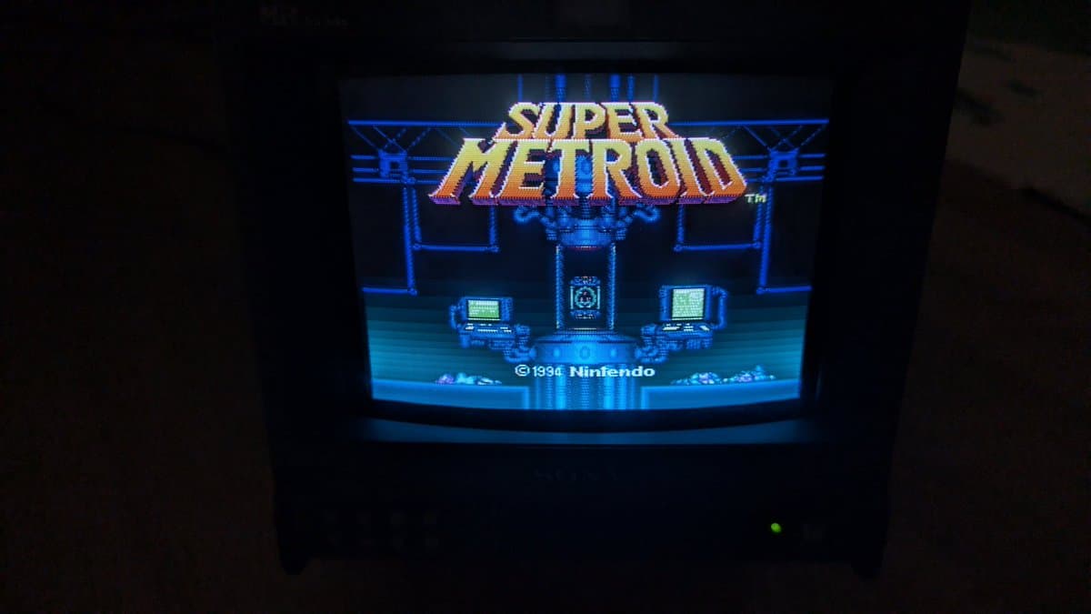 Super Metroid title screen displayed on Sony PVM monitor, showing restored Super Famicom Jr. output quality after recapping and upgrades.