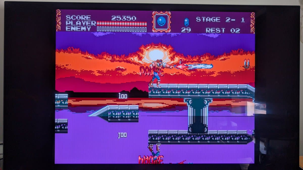 Sega Mega Drive running Earthworm Jim, Stage 2-1, with player health at 100 and enemy health at 29 during final test.