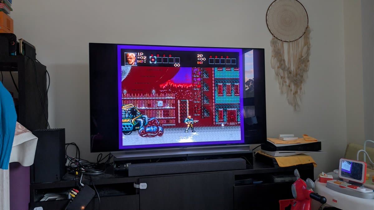 Sega Wondermega displaying Contra: Hard Corps on Mega Drive side, with Silpheed ready for Mega-CD testing on restored HWM-5010 unit.