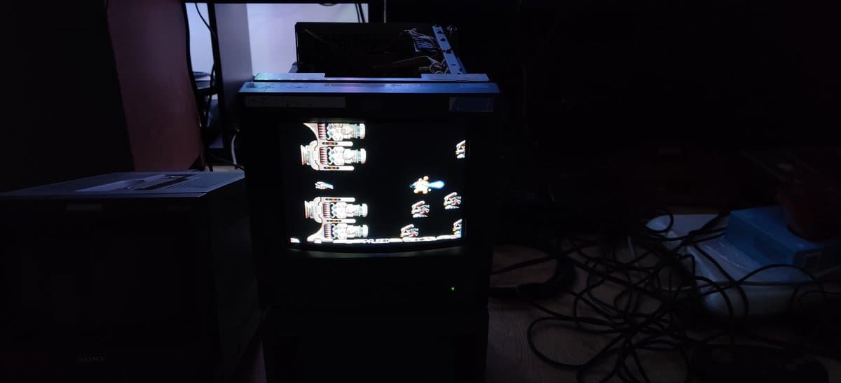 Sony PVM-9041Q CRT displaying R-Type homebrew demo with visible scanlines, showing restored monitor in operation during testing phase.
