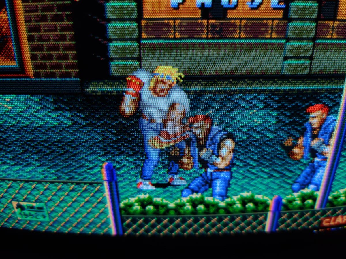 Streets of Rage gameplay on Ikegami HTM-1005RA2 CRT monitor, displaying vibrant colors and sharp image quality post-repair.