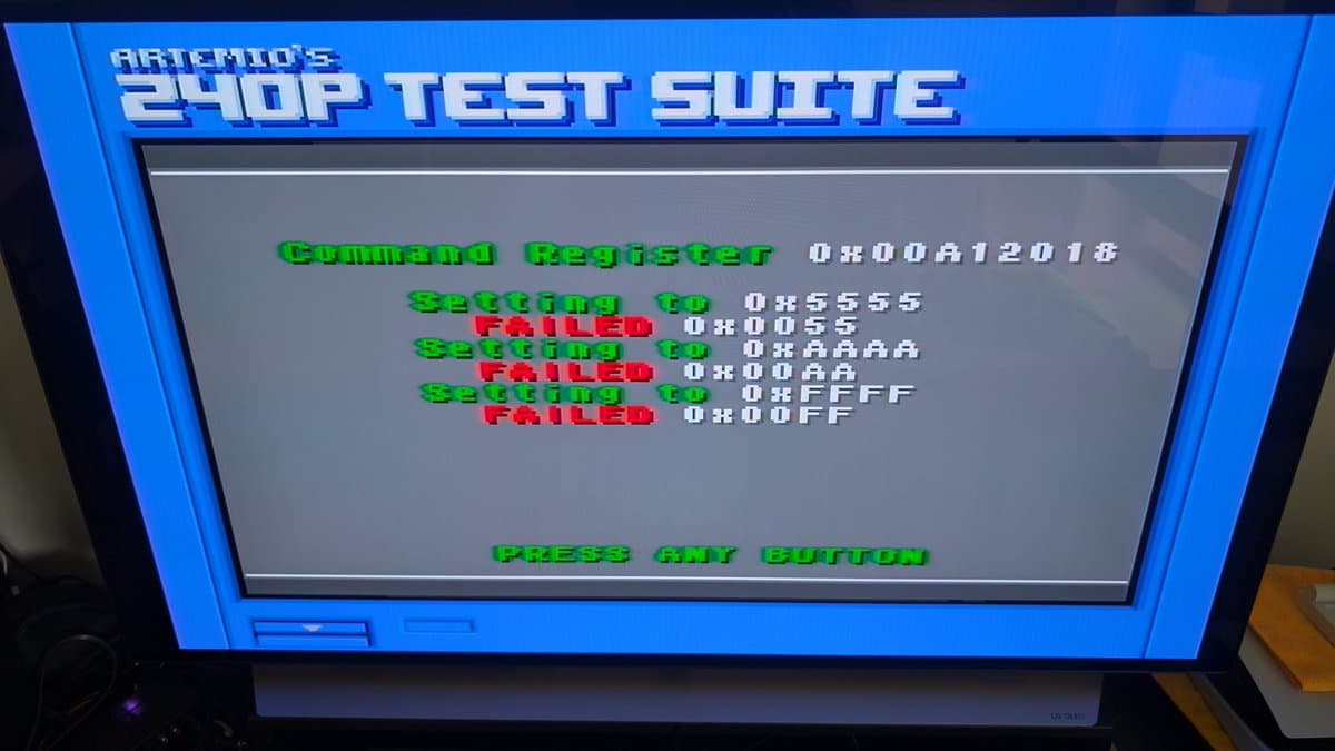 Sega Wondermega 240P test suite display showing command register failures in green and red text with hex values 0x00A12018, 0x5555, 0x0055, 0xAAAA, 0x00AA, 0xFFFF, 0x00FF.
